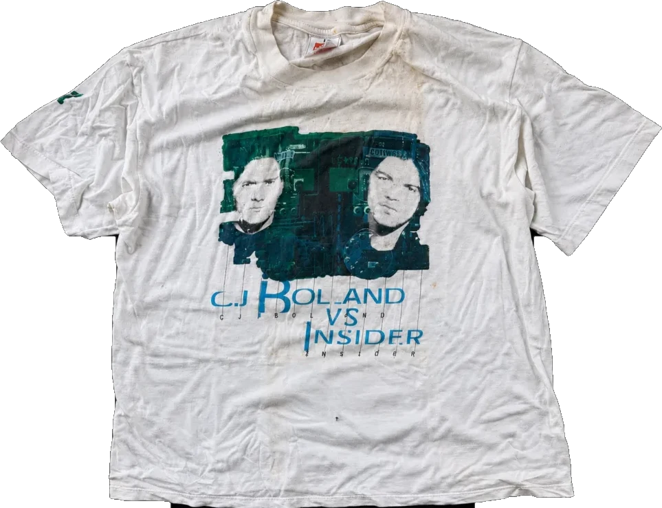 A worn white tour shirt printed “C.J. Bolland vs Insider”